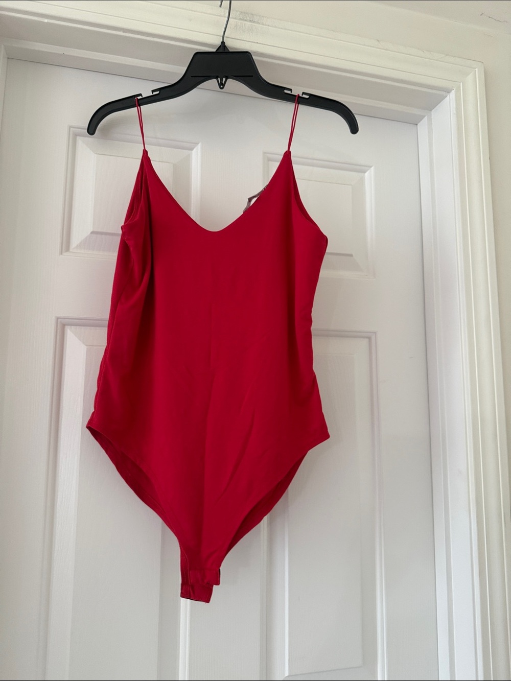 Red women’s spaghetti strap body suit